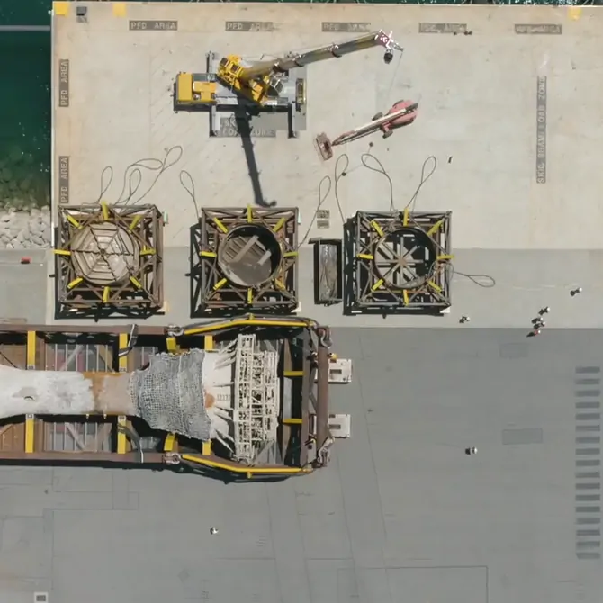 Maritime machinery on a dock beside the water
